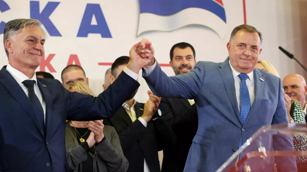 Milorad Dodik, former President of the Bosnian Serb Republic, and Sinisa Karan attend a pres conference after preliminary results indicated Karan won a snap presidential election in Banja Luka, Bosnia and Herzegovina, November 23, 2025. REUTERS/Amel Emric