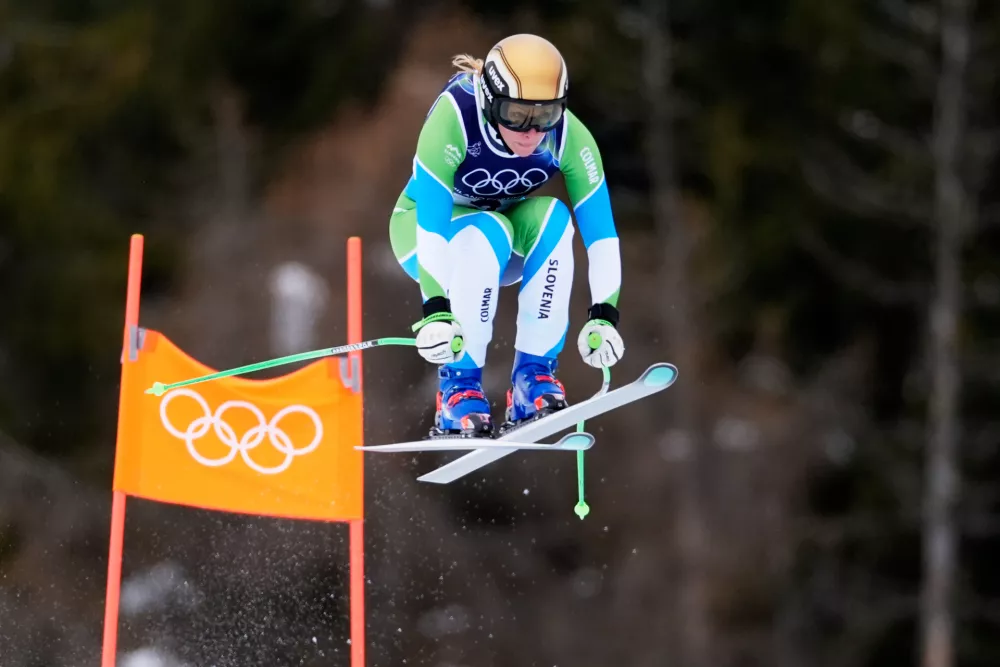 Slovenia's Ilka Stuhec speeds down the course during an alpine ski women's downhill training, at the 2026 Winter Olympics, in Cortina d'Ampezzo, Italy, Saturday, Feb. 7, 2026. (AP Photo/Robert F. Bukaty)