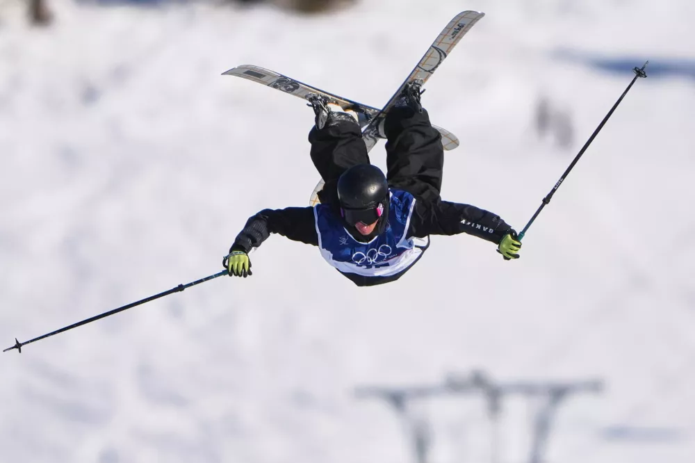 New Zealand's Lucas Ball competes during men's freestyle skiing slopestyle qualifications at the 2026 Winter Olympics, in Livigno, Italy, Saturday, Feb. 7, 2026. (AP Photo/Lindsey Wasson)