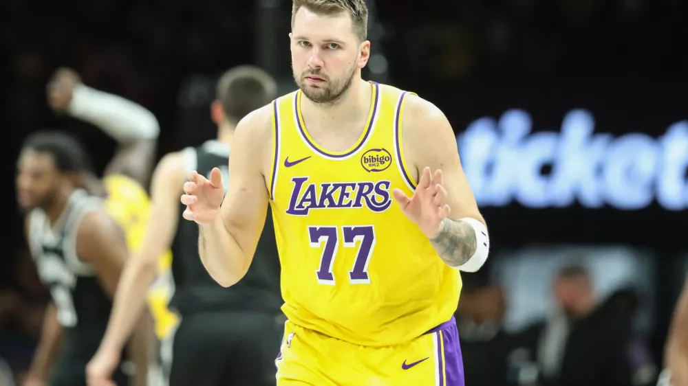 Feb 3, 2026; Brooklyn, New York, USA; Los Angeles Lakers guard Luka Doncic (77) gestures after scoring in the third quarter against the Brooklyn Nets at Barclays Center. Mandatory Credit: Wendell Cruz-Imagn Images