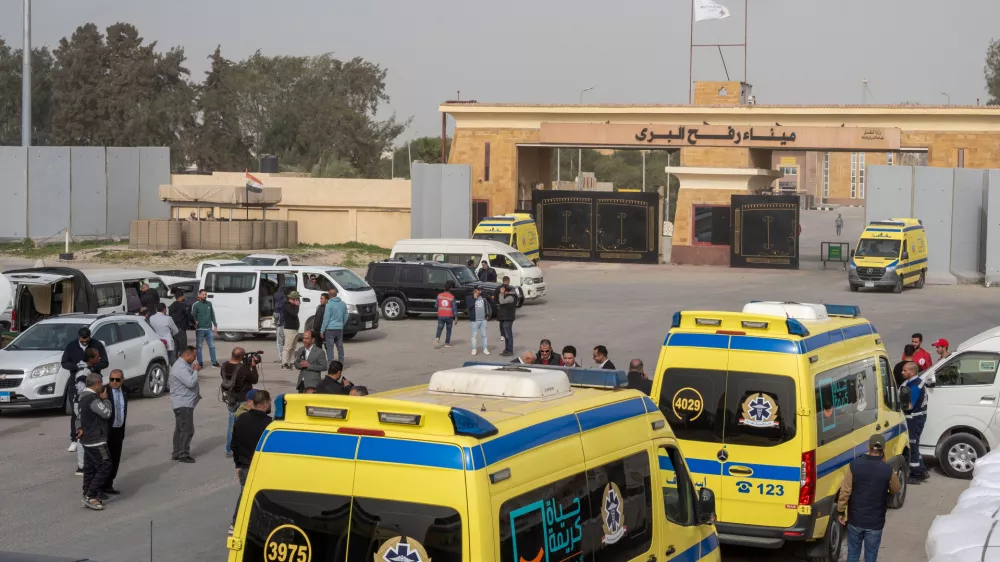 Ambulances line up to enter the Egyptian gate of the Rafah crossing into the Gaza Strip, in Rafah, Egypt, Monday, Feb. 2, 2026. (AP Photo/Mohamed Arafat)