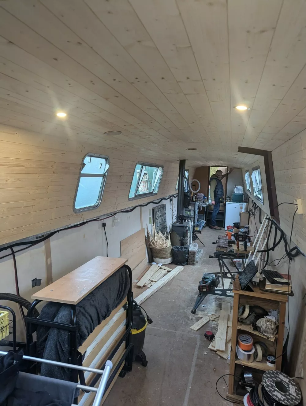 EXCLUSIVE: Story from Jam Press (Downsizing To Narrowboat) Pictured: Video grab - Inside Eleanor Sutcliffe's 50ft narrowboat during an updated tour of her floating home.VIDEO: 'I bought Ł15,000 50ft narrowboat to call home after relationship ended &ndash; it's the best decision I've ever made'A woman who lives aboard a tiny narrowboat says she took the "ultimate leap of faith" by buying it &ndash; and it's paid off.Eleanor Sutcliffe was dealing with the end of a relationship, and had moved out of the home she'd shared with her ex, when she came across the boat on sale via Facebook Marketplace.During the sale of her house, the 28-year-old says she couldn't afford another home in the area where she works."I needed to think outside the box, and I'd always wanted to live on a narrowboat," Eleanor, who is originally from North Wales but now lives in the Birmingham area, told What's The Jam."My parents have always supported any weird ideas I've had, and my dad said he would help me renovate one if we needed to."Neither of us had ever been on a boat before, but he is great at DIY and I've always been quite practical and love to learn new skills."Eleanor, a firefighter, said she is making savings by living on her boat compared to buying or renting a home in Birmingham.She added: "I find the cost is much better &ndash; my overall boat costs including mooring fee, license, insurance and fuel come to just under Ł500 a month."For context, to rent a flat near to where I work, I would be looking at around Ł750 or more for rent alone."Eleanor bought her 50ft-long 1986 Dartline boat in May 2024 for Ł15,000 and then took out a loan to complete the renovation works.She added: "I fell in love with my boat the first time I saw her."She was a bit of a mess, but I loved the thought of trying to restore her back to her former glory."Although the boat needed a full revamp, Eleanor moved in around October 2024, as her house had sold.She said: "I lived in it while we were still building.16 Jan 2026Pictured: Story from Jam Press (Downsizing To Narrowboat) Pictured: Inside the 50ft narrowboat during renovation, with insulation, wiring and timber panels being fitted.VIDEO: 'I bought Ł15,000 50ft narrowboat to call home after relationship ended &ndash; it's the best decision I've ever made'A woman who lives aboard a tiny narrowboat says she took the "ultimate leap of faith" by buying it &ndash; and it's paid off.Eleanor Sutcliffe was dealing with the end of a relationship, and had moved out of the home she'd shared with her ex, when she came across the boat on sale via Facebook Marketplace.During the sale of her house, the 28-year-old says she couldn't afford another home in the area where she works."I needed to think outside the box, and I'd always wanted to live on a narrowboat," Eleanor, who is originally from North Wales but now lives in the Birmingham area, told What's The Jam."My parents have always supported any weird ideas I've had, and my dad said he would help me renovate one if w.,Image: 1066470249, License: Rights-managed, Restrictions: NO Australia, Germany, Norway, South Korea, Sweden, United Kingdom, United States, Unknown Country, Model Release: no