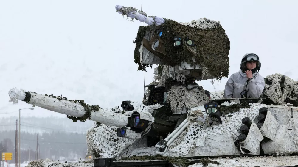 FILE PHOTO: A member of the Norwegian army participates in a military exercise called "Cold Response 2022", gathering around 30,000 troops from NATO member countries as well as Finland and Sweden, amid Russia's invasion of Ukraine, in Setermoen in the Arctic Circle, Norway, March 25, 2022. REUTERS/Yves Herman/File Photo