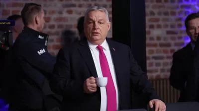 Hungary's Prime Minister Viktor Orban waits for the start of a round table meeting for the EU summit at Alden Biesen Castle in Bilzen-Hoeselt, Belgium, Thursday, Feb. 12, 2026. (AP Photo/Omar Havana)