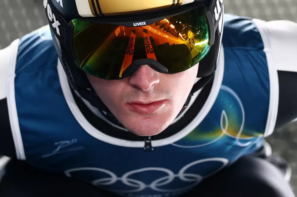 Milano Cortina 2026 Olympics - Ski Jumping - Men's Large Hill - Official Training 2 - Predazzo Ski Jumping Stadium, Predazzo, Italy - February 13, 2026. Domen Prevc of Slovenia before his jump during training REUTERS/Kai Pfaffenbach