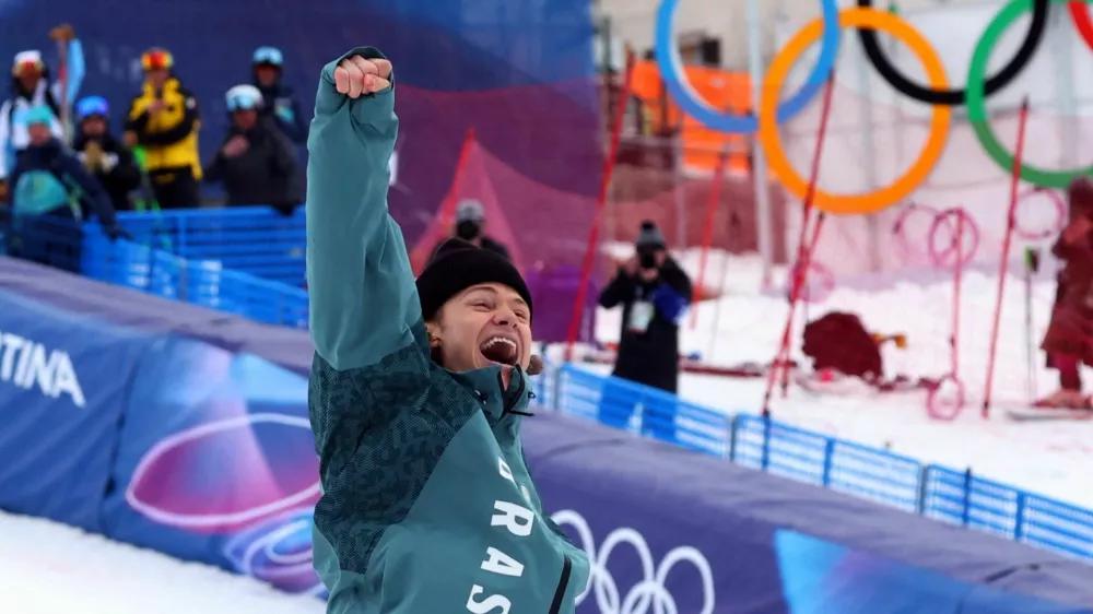 Milano Cortina 2026 Olympics - Alpine Skiing - Men's Giant Slalom Victory Ceremony - Stelvio Ski Centre, Bormio, Italy - February 14, 2026. Gold medallist Lucas Pinheiro Braathen of Brazil celebrates on the podium during the men's giant slalom victory ceremony REUTERS/Denis Balibouse