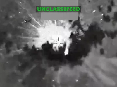 An explosion occurs on a vessel during what the U.S. military says was a kinetic strike on a suspected drug trafficking vessel in the Caribbean, at an unidentified location in this screen grab obtained from a video released on February 13, 2026. US Southern Command/Handout via REUTERS THIS IMAGE HAS BEEN SUPPLIED BY A THIRD PARTY. MANDATORY CREDIT. TEXT OVERLAY AND BLURRING FROM SOURCE.  Verification: Reuters was not able to independently verify the date and location of the footage and identity of the vessel.   TPX IMAGES OF THE DAY