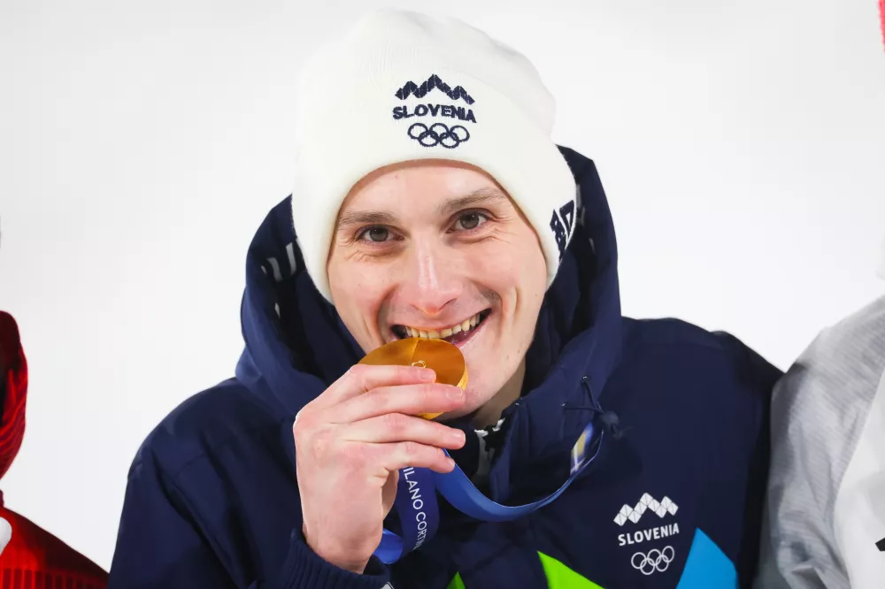 Italija, Predazzo.Zimske olimpijske igre 2026.Smucarski skoki, velika skakalnica, moski.Olimpijski prvak na veliki skakalnici Domen Prevc.