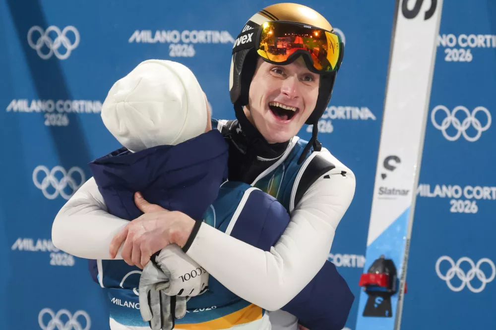 Italija, Predazzo.Zimske olimpijske igre 2026.Smucarski skoki, velika skakalnica, moski.Olimpijski prvak na veliki skakalnici Domen Prevc.