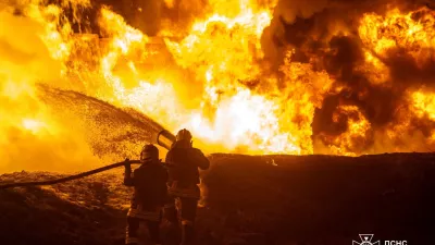 Firefighters work at the site of a railway infrastructure facility hit during overnight Russian drone strikes, amid Russia's attack on Ukraine, in Odesa, Ukraine February 15, 2026. Press service of the State Emergency Service of Ukraine in Odesa region/Handout via REUTERS ATTENTION EDITORS - THIS IMAGE HAS BEEN SUPPLIED BY A THIRD PARTY. DO NOT OBSCURE LOGO.   TPX IMAGES OF THE DAY