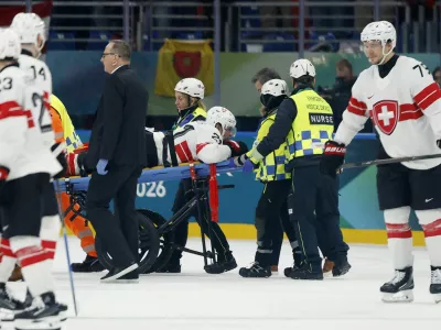 Milano Cortina 2026 Olympics - Ice Hockey - Men's Preliminary Round - Group A - Canada vs Switzerland - Milano Santagiulia Ice Hockey Arena, Milan, Italy - February 13, 2026. Kevin Fiala of Switzerland is stretchered off by medical staff after sustaining an injury IMAGN IMAGES via REUTERS/Geoff Burke
