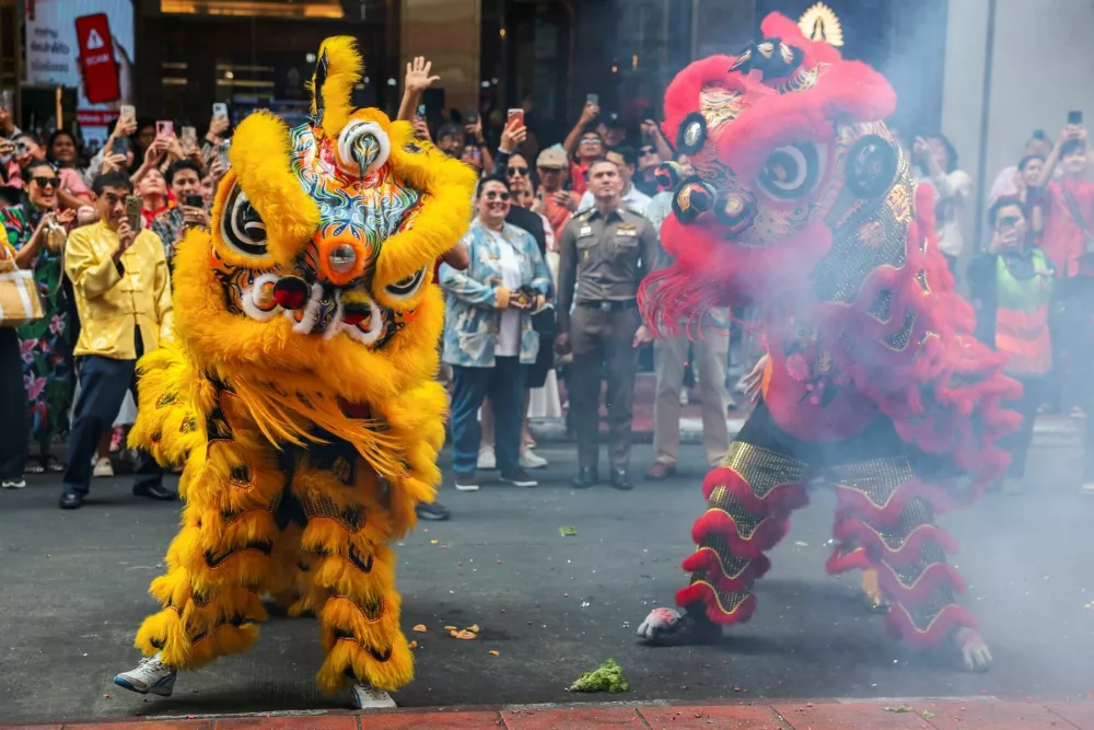 Lion dancers perform on the eve of Lunar New Year in Chinatown, Bangkok, Thailand, February 16, 2026. REUTERS/Chalinee Thirasupa
