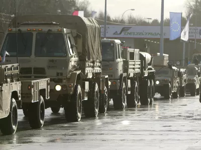 U.S. Army vehicles cross the Polish border in Olszyna, Poland, Thursday, Jan. 12, 2017 heading for their new base in Zagan. First U.S. troops arrive in Zagan in western Poland as part of deterrence force of some 1,000 troops to be based here and reassure Poland that is worried about Russia's activity. (AP Photo/Czarek Sokolowski)
