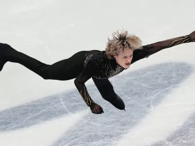 Ilia Malinin of the United States competes during the men's free skate program in figure skating at the 2026 Winter Olympics, in Milan, Italy, Friday, Feb. 13, 2026. (AP Photo/Francisco Seco)