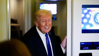 U.S. President Donald Trump reacts as he speaks to reporters onboard Air Force One, on travel from West Palm Beach, Florida, to Joint Base Andrews, Maryland, U.S., February 16, 2026. REUTERS/Elizabeth Frantz