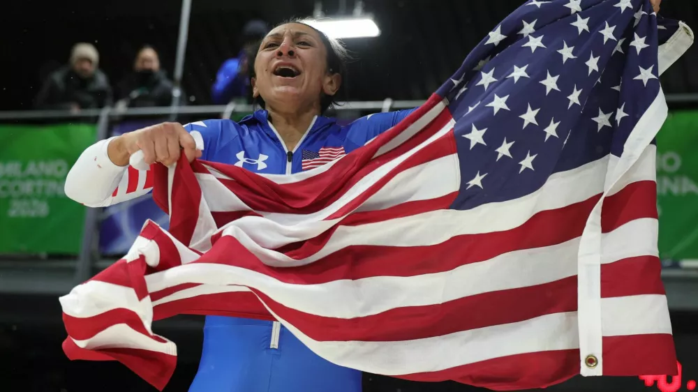 Milano Cortina 2026 Olympics - Bobsleigh - Women's Monobob Heat 4 - Cortina Sliding Centre, Cortina d'Ampezzo, Italy - February 16, 2026. Gold medallist Elana Meyers Taylor of United States celebrates winning Women's Monobob REUTERS/Athit Perawongmetha