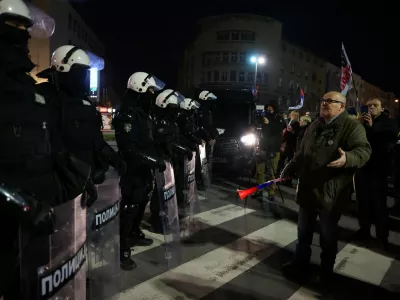 Police officers stand guard as students and their supporters gather to protest, as part of ongoing demonstrations sparked by the collapse of the Novi Sad railway station canopy in November 2024, coinciding with an official state ceremony attended by senior government officials marking the 200th anniversary of Serbia's oldest cultural and literary institution in the city centre,&nbsp;in Novi Sad, Serbia, February 16, 2026. REUTERS/Zorana Jevtic