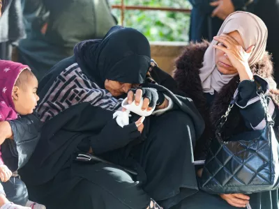 Mourners react during the funeral of Palestinians killed in an overnight Israeli strike, according to medics, at Nasser Hospital in Khan Younis in the southern Gaza Strip, February 15, 2026. REUTERS/Ramadan Abed