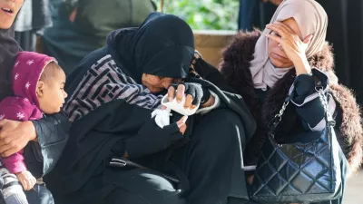 Mourners react during the funeral of Palestinians killed in an overnight Israeli strike, according to medics, at Nasser Hospital in Khan Younis in the southern Gaza Strip, February 15, 2026. REUTERS/Ramadan Abed