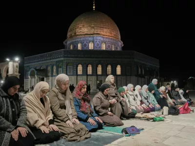 Muslim worshippers perform the evening Tarawih prayers during the holy fasting month of Ramadan, next to the Dome of Rock shrine at the Al-Aqsa Mosque compound in Jerusalem's Old City, Tuesday, Feb. 17, 2026. (AP Photo/Mahmoud Illean)