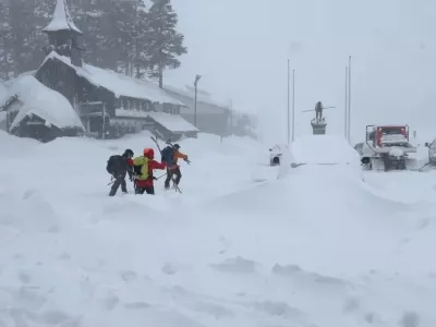 This image provided by the Nevada County Sheriff's Office shows members of a rescue team in Soda Springs, California on Tuesday, Feb. 17, 2026. (Nevada County Sheriff's Office via AP)