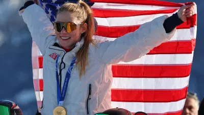 United States' Mikaela Shiffrin celebrates winning the gold medal of the alpine ski, women's slalom race, at the 2026 Winter Olympics, in Cortina d'Ampezzo, Italy, Wednesday, Feb. 18, 2026. (AP Photo/Marco Trovati)
