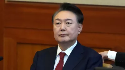 FILE - South Korea's impeached President Yoon Suk Yeol attends a hearing of his impeachment trial at the Constitutional Court in Seoul, South Korea, Feb. 11, 2025. (AP Photo/Lee Jin-man, Pool, File)