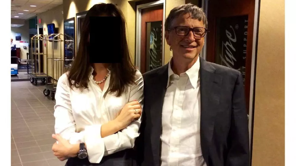 Bill Gates appears with a woman, who's identity has been obscured, in this image from the Epstein estate released by House Oversight Committee Democrats in Washington, D.C., U.S., on December 18, 2025. House Oversight Committee Democrats/Handout via REUTERS THIS IMAGE HAS BEEN SUPPLIED BY A THIRD PARTY. REDACTED AREA FROM SOURCE.