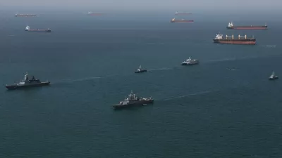 This image provided Thursday Feb. 19, 2026 by the Iranian military and dand dated Wednesday, Feb. 18, 2025, shows navy ships conducting operations during a join drill by Iranian and Russian forces in the Indian Ocean.(Masoud Nazari Mehrabi/Iranian Army via AP)