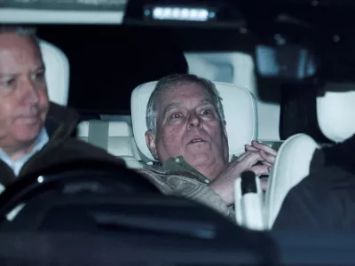 FILE PHOTO: Andrew Mountbatten Windsor, younger brother of Britain's King Charles, formerly known as Prince Andrew, leaves Aylsham Police Station on a vehicle, on the day he was arrested on suspicion of misconduct in public office, after the U.S. Justice Department released more records tied to the late financier and convicted sex offender Jeffrey Epstein, in Aylsham, Britain, February 19, 2026. REUTERS/Phil Noble/File Photo