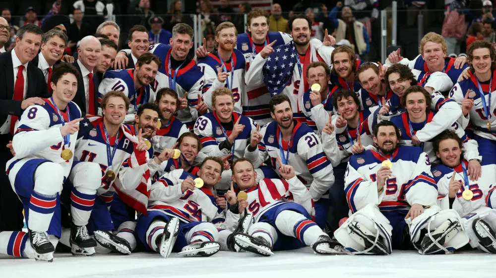 Milano Cortina 2026 Olympics - Ice Hockey - Men's Victory Ceremony - Milano Santagiulia Ice Hockey Arena, Milan, Italy - February 22, 2026. Gold medallists United States celebrate during the victory ceremony REUTERS/Mike Segar