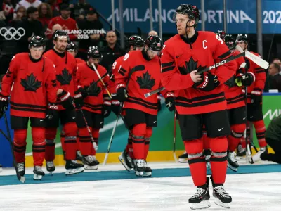Milano Cortina 2026 Olympics - Ice Hockey - Men's Gold Medal Game - Canada vs United States - Milano Santagiulia Ice Hockey Arena, Milan, Italy - February 22, 2026. Connor McDavid of Canada looks dejected after the match REUTERS/Mike Segar