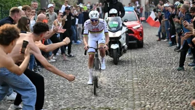 Reigning World Champion Tadej Pogacar pedals on his way to win Il Lombardia, Tour of Lombardy cycling race, in Bergamo, Italy, Saturday, Oct. 11, 2025. (Luca Bettini, LaPresse Pool via AP)