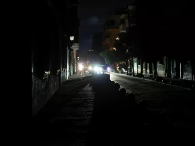 Vehicles go by on the streets in the Colonial Zone during a nationwide blackout caused by a major failure in the national power grid, in Santo Domingo, Dominican Republic, February 23, 2026. REUTERS/Erika Santelices
