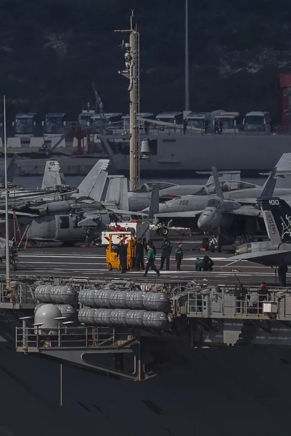 Aircraft stand on the USS Gerald R. Ford aircraft carrier as it arrives at Souda Bay on the island of Crete, Greece, February 23, 2026. REUTERS/Stelios Misinas