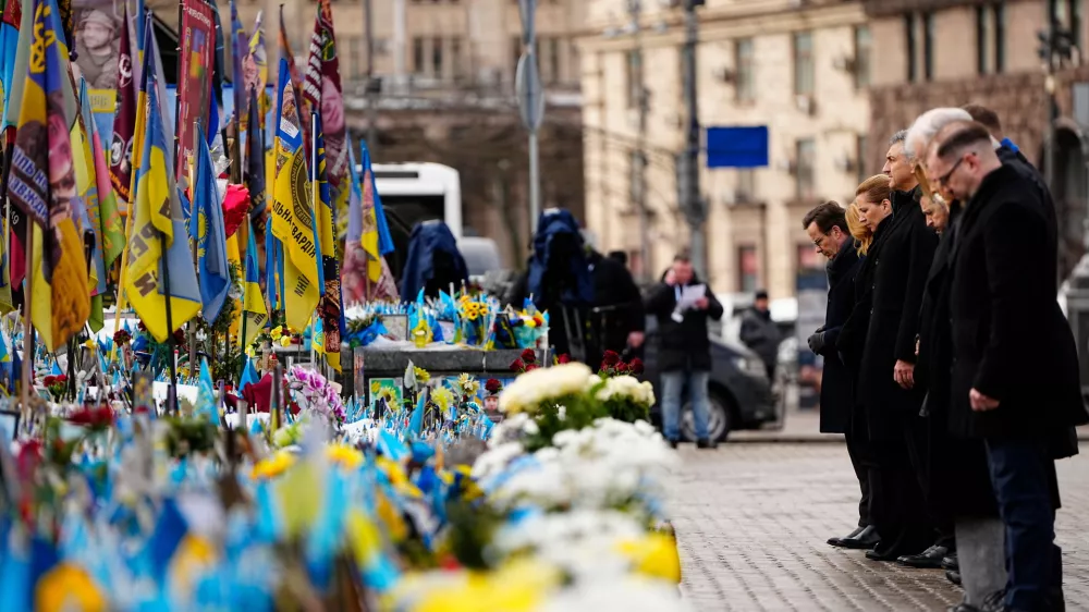 Denmark's Prime Minister Mette Frederiksen, third from left, President of Ukraine Volodymyr Zelenskyy participate in a memorial ceremony for fallen soldiers at Maidan Square in Kyiv, Ukraine, Tuesday, Feb. 24, 2026. (Mads Claus Rasmussen/Ritzau Scanpix via AP)