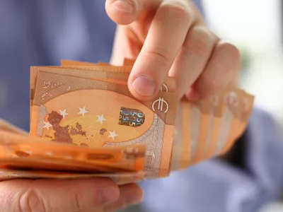 Person Counting Money Savings Finance Concept. Caucasian Businessman Holding Euro Cash in Hand. Business Financing Accounting. Accountant Man Check Wealth Balance and Growth. Tax, Bill Payment