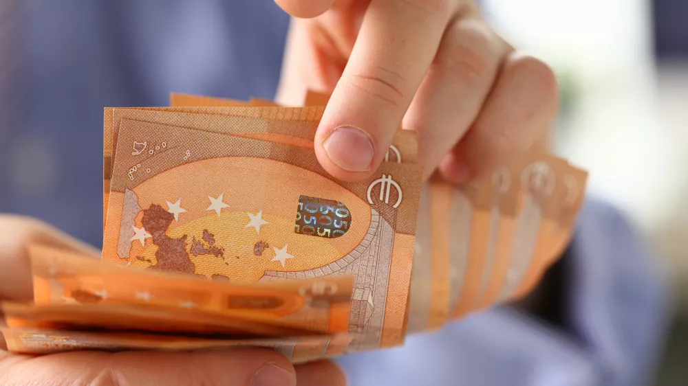 Person Counting Money Savings Finance Concept. Caucasian Businessman Holding Euro Cash in Hand. Business Financing Accounting. Accountant Man Check Wealth Balance and Growth. Tax, Bill Payment