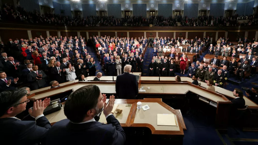 Members of the Congress give a standing ovation as U.S. President Donald Trump delivers the State of the Union address in the House Chamber of the U.S. Capitol in Washington, D.C., U.S., February 24, 2026. REUTERS/Jessica Koscielniak/Pool