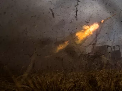 FILE - A Ukrainian MSLR BM-21 "Grad" rocket launcher of the 95 Air Assault brigade fires towards Russian positions at the frontline near Kreminna, Ukraine, Thursday, March 9, 2023. (AP Photo/Evgeniy Maloletka, File)