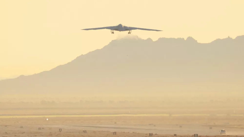 FILE PHOTO: The United States Air Force's B-21 "Raider", the long-range stealth bomber that can be armed with nuclear weapons, takes off from the runway at Northrop Grumman's site at Air Force Plant 42, during its first flight, in Palmdale, California, U.S., November 10, 2023. REUTERS/David Swanson/File Photo