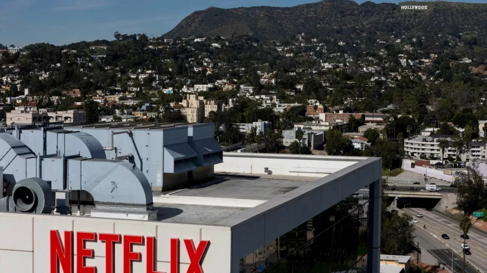FILE PHOTO: A drone view shows the Netflix logo on one of the company's buildings in the Hollywood neighborhood in Los Angeles, California, U.S., January 20, 2026. REUTERS/Daniel Cole/File Photo