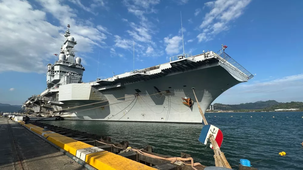 FILE - French aircraft carrier The Charles de Gaulle docks at Subic Bay port, a former U.S. Naval base northwest of Manila, Philippines, Sunday, Feb. 23, 2025. (AP Photo/Joeal Calupitan, File)