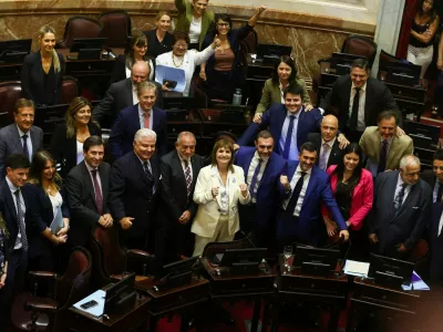 Senator Patricia Bullrich celebrates with other senators, as the senate passes the labor reform law proposed by President Javier Milei's libertarian government to attract investment and revive growth, and which unions say will roll back workers' rights, in Buenos Aires, Argentina February 27, 2026. REUTERS/Matias Baglietto