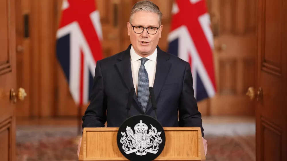 Britain's Prime Minister Keir Starmer issues a statement at 10 Downing Street, London, on the latest developments in the Middle East, Saturday Feb. 28, 2026. (Jonathan Brady/Pool via AP)