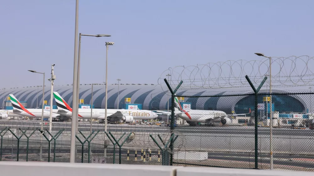 Planes are parked at Terminal 3 of the Dubai International Airport, following the United States and Israel strikes on Iran, in Dubai, United Arab Emirates, March 2, 2026. REUTERS/Raghed Waked