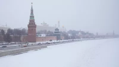 A view of the Kremlin and the ice-covered Moskva River during snowfall in Moscow, Wednesday, Feb. 11, 2026. (AP Photo/Pavel Bednyakov)