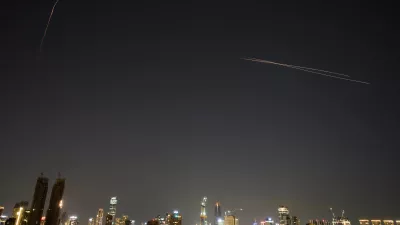 Israeli air defense system fires to intercept missiles during an Iranian attack over Tel Aviv, Israel, early Tuesday, March 3, 2026. (AP Photo/Ohad Zwigenberg)