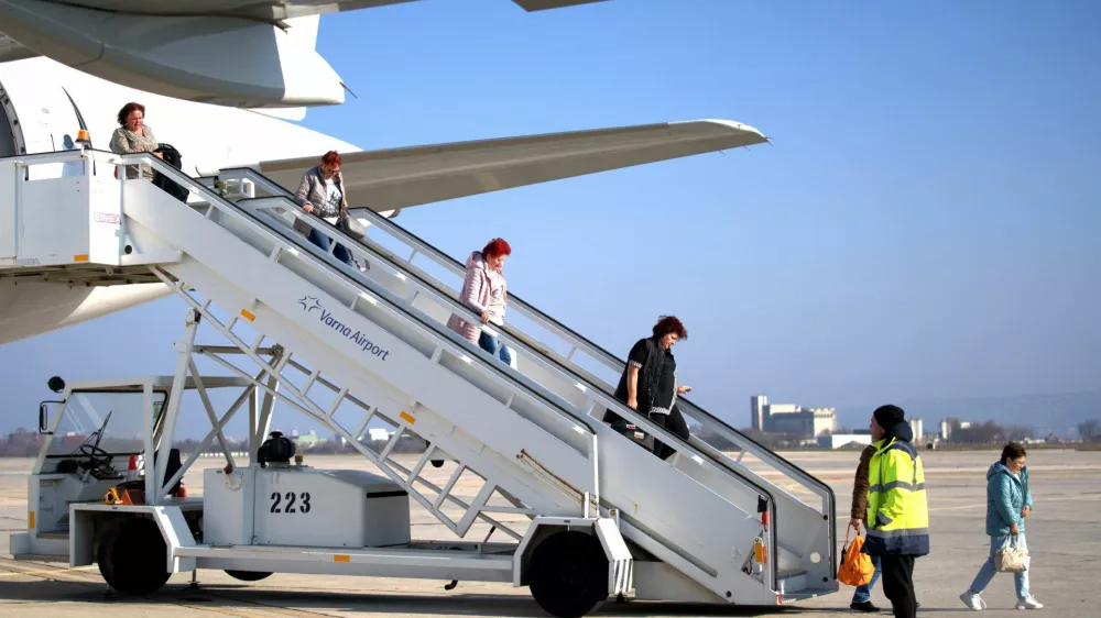 FILE PHOTO: People who were stranded in Dubai amid the U.S.-Israeli conflict with Iran, arrive at Varna Airport, in Varna, Bulgaria, March 4, 2026. REUTERS/Orlin Tsanev/File Photo