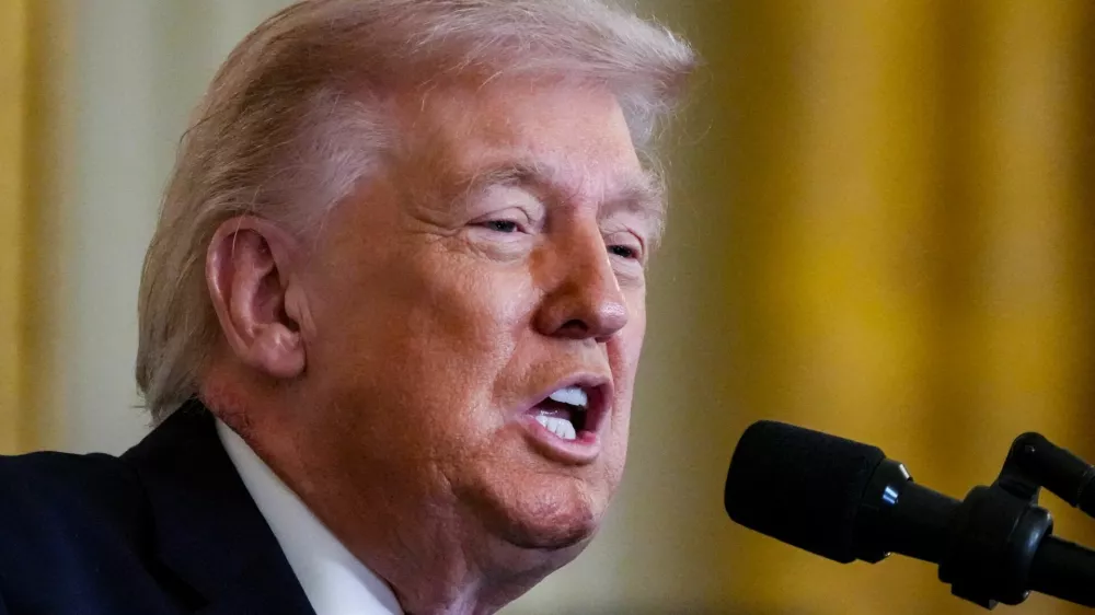 FILE PHOTO: U.S. President Donald Trump speaks, as a patch of blemished skin is visible above his shirt collar, during a Medal of Honor ceremony at the White House in Washington, D.C., U.S., March 2, 2026. REUTERS/Ken Cedeno/File Photo